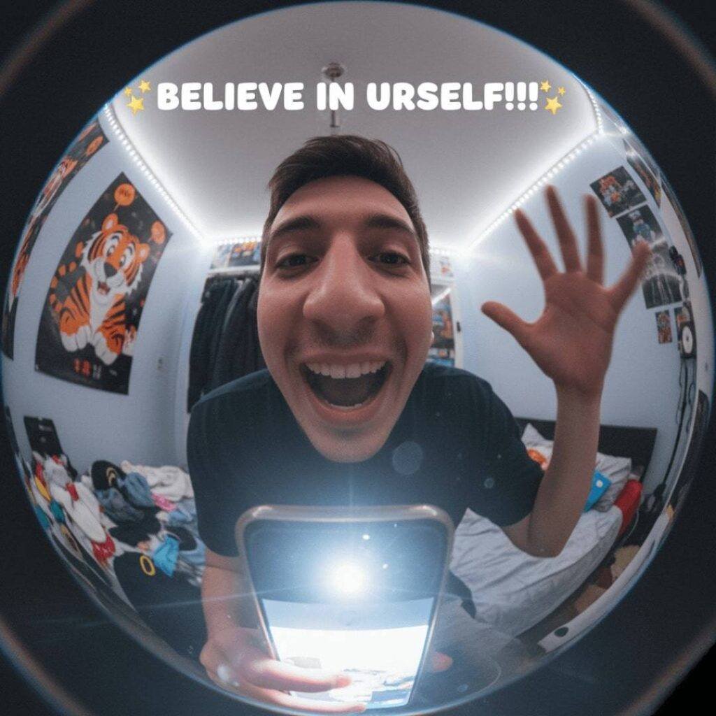 Me, rambling about self-belief with a dorky grin.